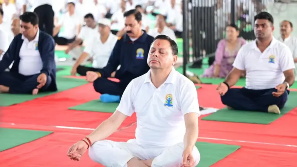 International Yoga Day in Uttarakhand: सीएम धामी ने बनबसा में किया योग; उत्तराखंड को ‘योग एवं वेलनेस की वैश्विक राजधानी’ बनाने का संकल्प