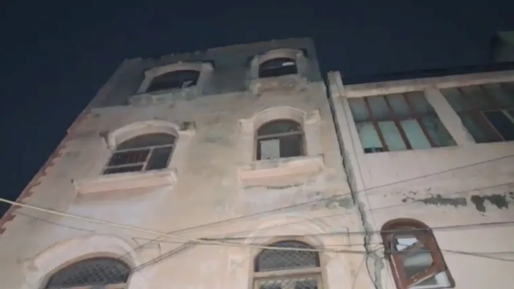 dilapidated building suddenly tilted
